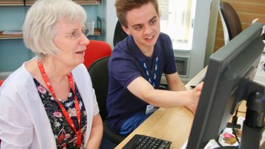 James Mansfield helps out teaching technology to the older generation.