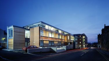 Exterior of the Health Centre building at night