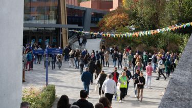 Attendees at ug open day walking past the students' union