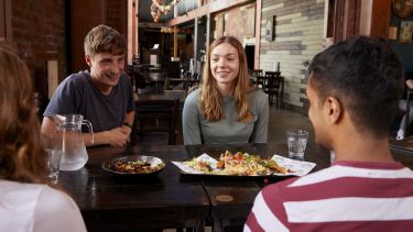 Sheffield students eating at a restaurant in Kelham Island
