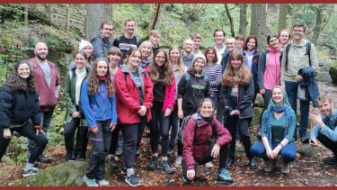 large group of students in outdoor gear in the Peak District