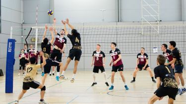University of Sheffield and Sheffield Hallam students playing volleyball as part of Sheffield Varsity