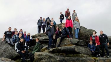 Group students on High Tor or somewhere in the Peak district 