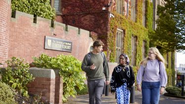 Students walking up from Firth Court