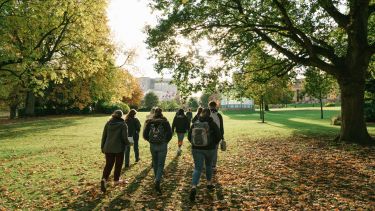 A group of students walking through Weston Park