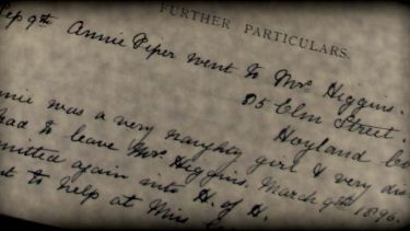 Cursive script written on old, stained paper