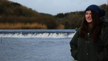 Samantha Skinner standing in front of river