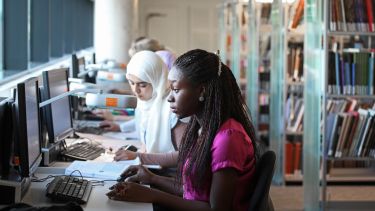 Students studying in the library