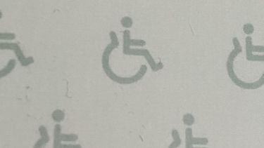 Disability signs on a grey background