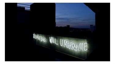 I love you will u marry me neon sign on concrete bridge