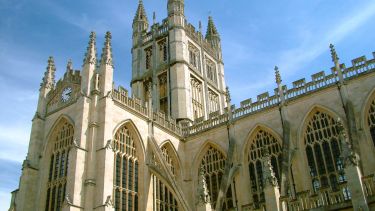 The outside of Bath Abbey on a warm summer's day