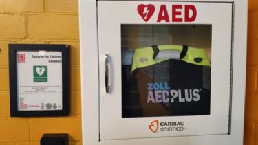 A close-up of the automated external defibrillator in the Norton Top Pavilion.