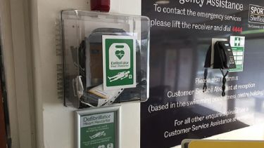 A close-up of the automated external defibrillator in Goodwin Sports Centre.