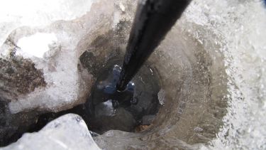 Hot-water drilling to collect measurements of temperature through the centre of Khumbu Glacier