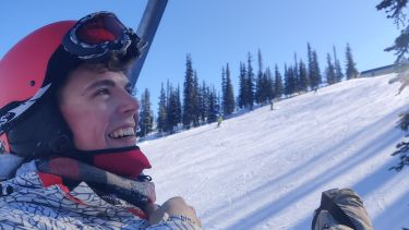 Jean-Mickael Hopkinson on a ski lift