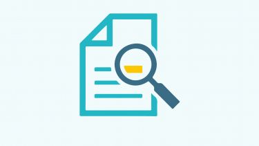 An icon showing a piece of paper and magnifying glass