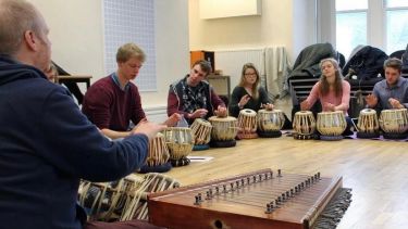 Group of students drumming 