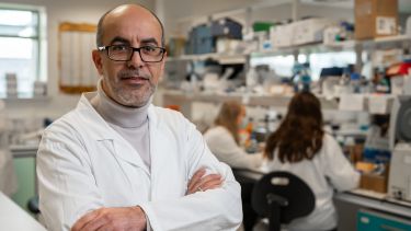 Portrait of Professor Azzouz in a lab at SITRAN
