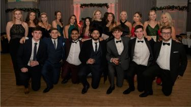 Photograph of EdBram members in formal wear at one of their much-anticipated balls
