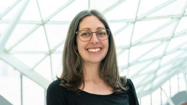 A photo of the Head of Department smiling at the camera