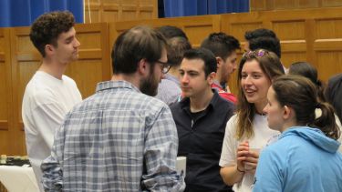 Photo of PhD students networking 