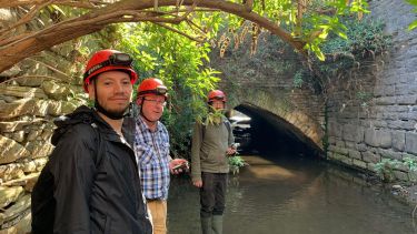 Group walking through river 