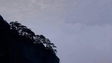 Iana Zhornik, Sunset at the peak of Huangshan - Famous Landscapes & Cityscapes 3rd