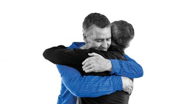 two men hugging