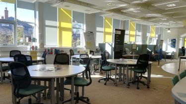 A photo of the MASH room inside the Academic Skills Centre, with tables and chairs