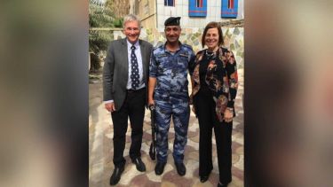 Nigel and Deborah Bax and a protection officer at the College of Medicine, Baghdad