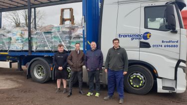 Adam (far right) with the haulier and local MP.