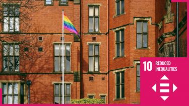 Firth Court with LGBT rainbow flag with sdg10 logo overlaid