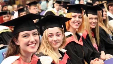 Graduates in hall