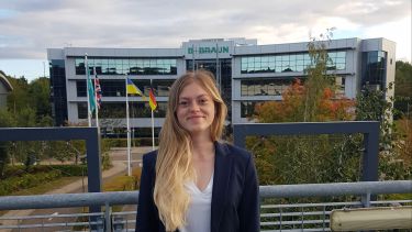 Politics student Joanna in front of the Headquarters of medical tech company B.Braun where she did her placement
