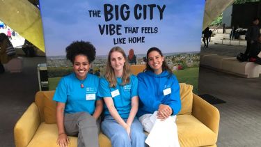 Three of our politics ambassadors sat together on the yellow sofa from the Sheffield city wide university campaign