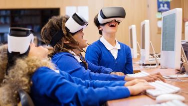 Children using VR headsets