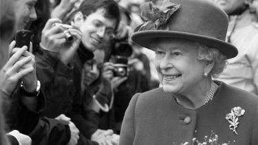 An image in black and white of the Queen during her 2010 visit to the University of Sheffield