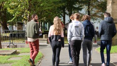 Students walking in a group during a tour of the campus