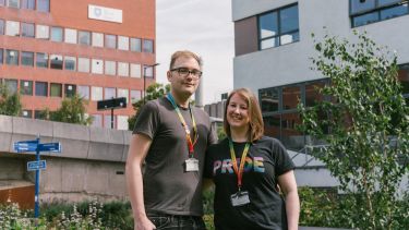 LGBT+ Staff Network Chairs outside, photographed at the Students' Union concourse