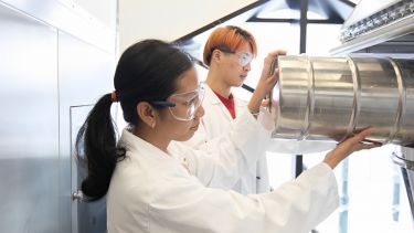 Students working inside a tech lab in the Diamond.