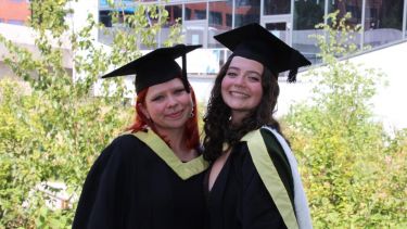 A photo of Ailsa with a friend at her graduation 