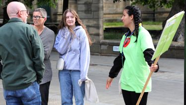 Prospective student with parents and student ambassador at an open day