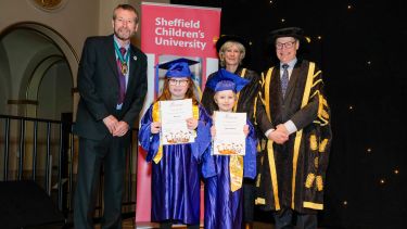 Two children receive their degrees from Sheffield Children's University