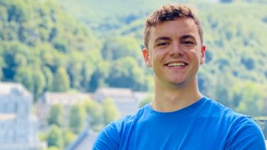Stefano Di Gregorio wearing a blue t-shirt.