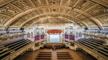 The view of the stage in Morecambe Winter Gardens from its centre balcony