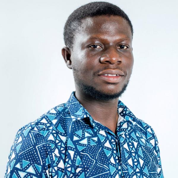 Profile picture of A head and shoulders photograph of Dominic Essuman.