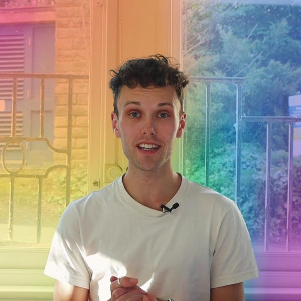 Profile picture of Dr Dean Cooper Cunningham with rainbow gradient in background
