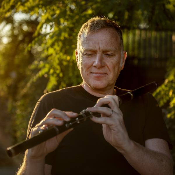 Profile picture of Man playing flute
