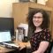 PhD student at desk working