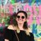 Lauren in front of some street art